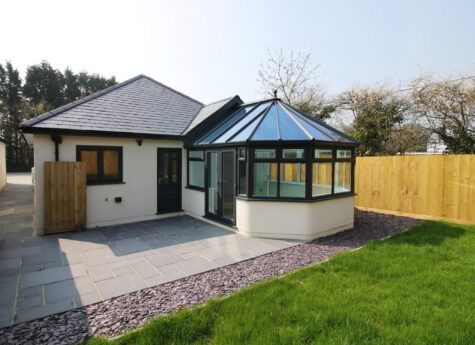 Highly energy efficient bungalow finished in an off-white render