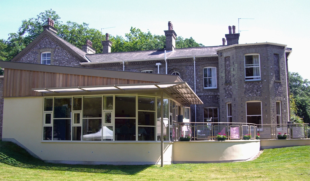 A single storey extension at the rear to an old stately home