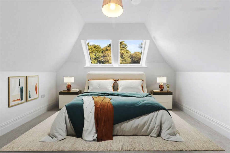 Cleanly decorated bedroom in the warm roof space